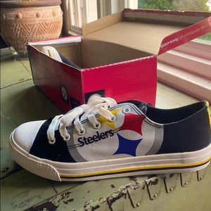 Brand new in box. Men’s STEELERS sneakers.
